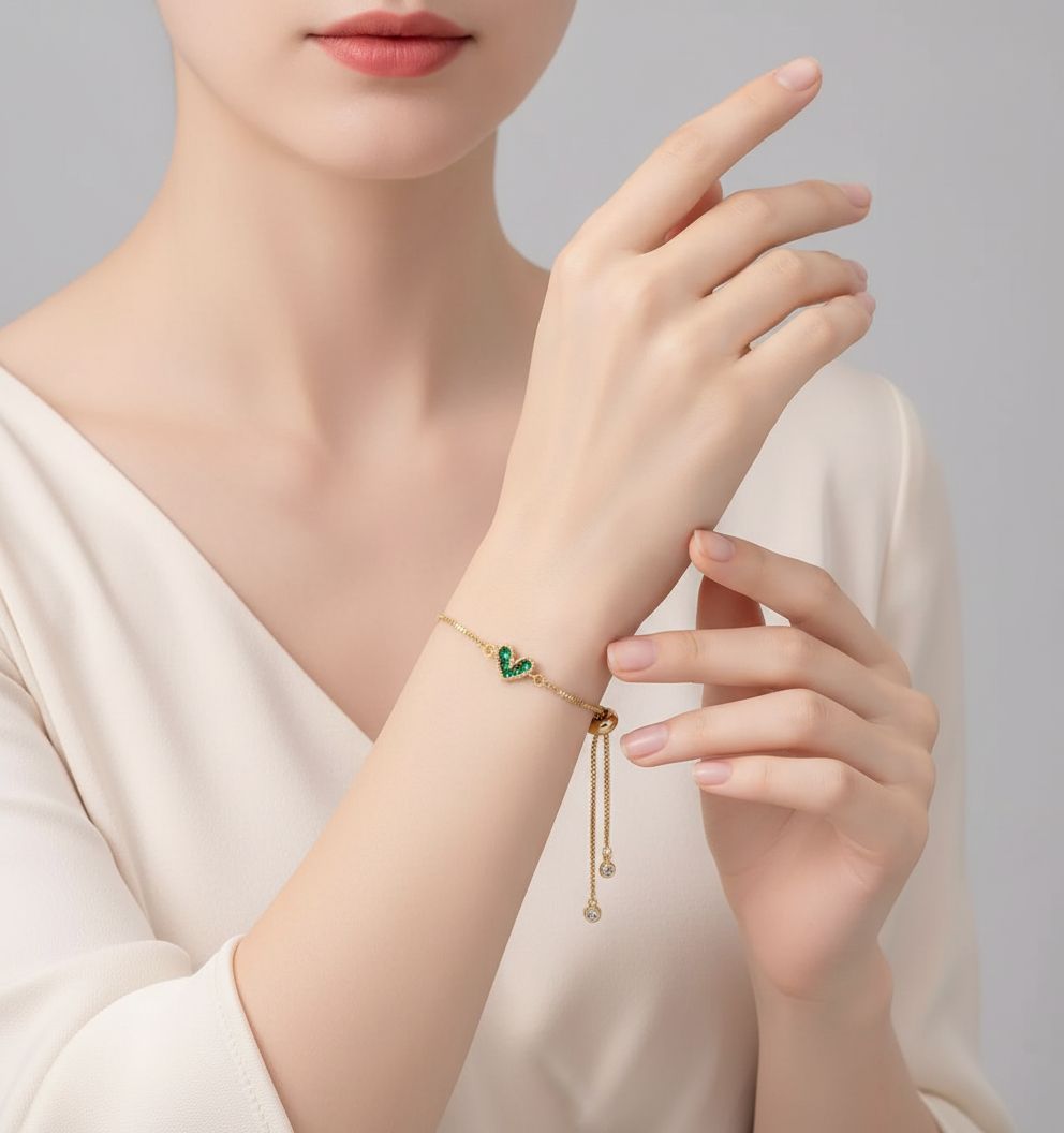 Adjustable Gold Heart Bracelet with Green Zircon Stones