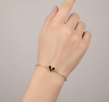 Adjustable Gold Heart Bracelet with Green Zircon Stones