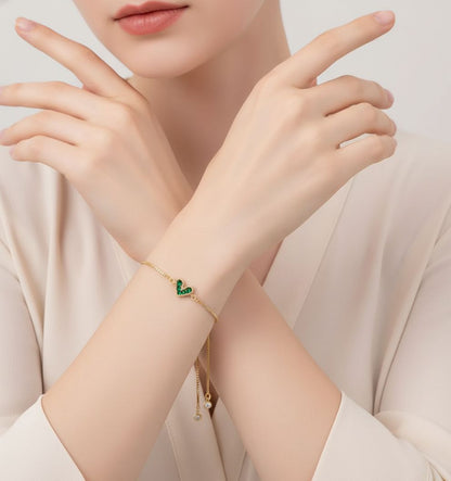 Adjustable Gold Heart Bracelet with Green Zircon Stones